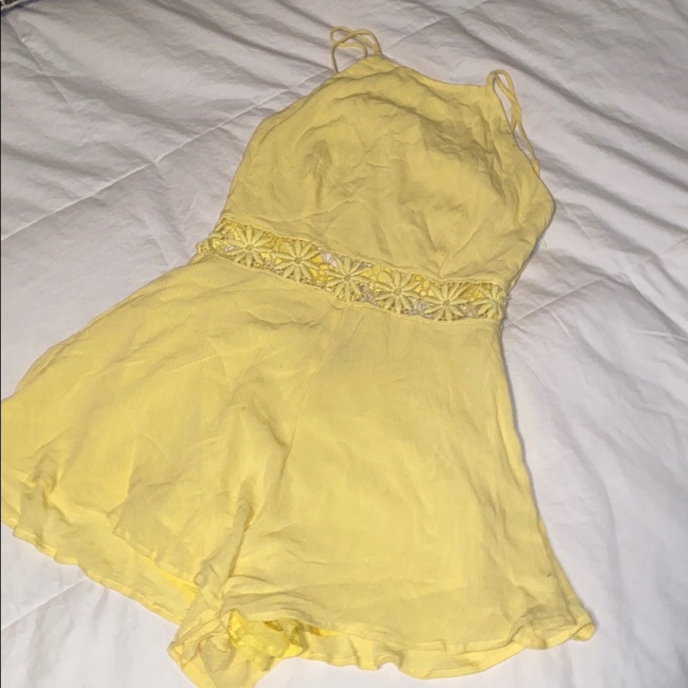 Light Yellow Romper with Flower Cutouts